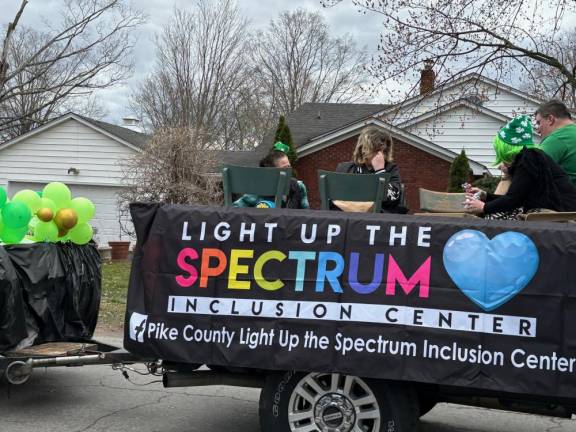Light up the spectrum Inclusion Center had a float.