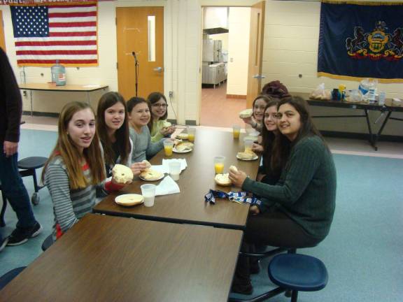 Pictured on left (from bottom): Jenna Reich, Alexis Kleber, Olivia O&#x2019;Grady and Kaleigh Kuddar. (Right) Hannah Williams, Alice Cauchi and Teacher Luanna Sauschuck.