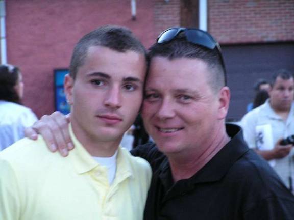 Gage Krakower with dad, Marty, at his graduation(Photo contributed)