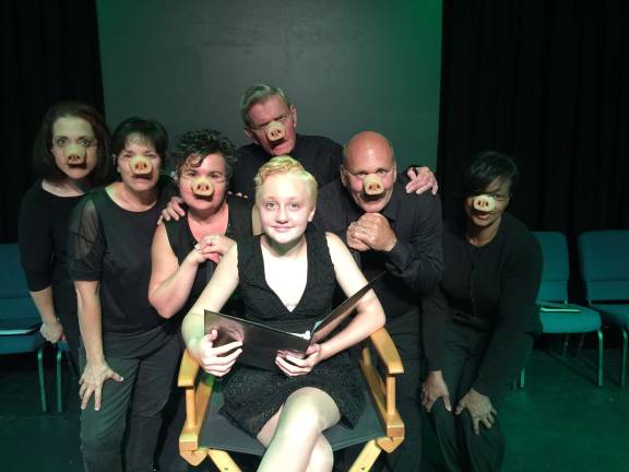 Pictured up front is Kelsey Clarke, a sixth grader who will narrate the play, with the rest of the cast (Photo provided)