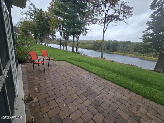 Enjoy river views and luxury living in this upscale townhome