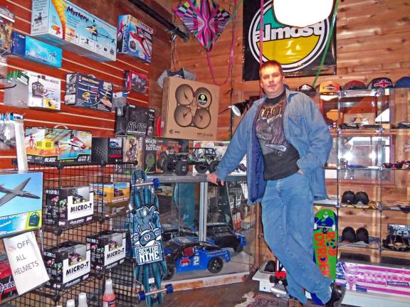 Christopher Graham of NWV Hobby and Tech, with some of his toys. - Photo by Charles Reynolds