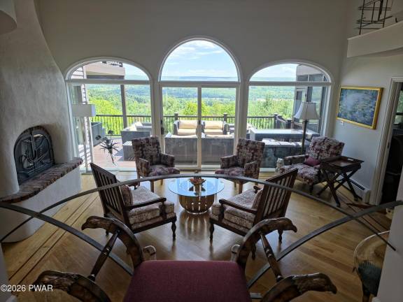 Experience luxury indoor-outdoor living on a mountaintop retreat