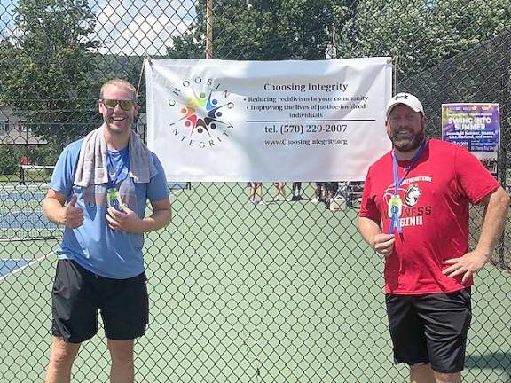 Craig (left) and Scott Onofry, winners of the “Choosing Integrity” first pickleball tournament