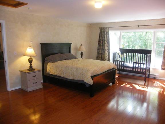 Modern three-bedroom split level with lake rights