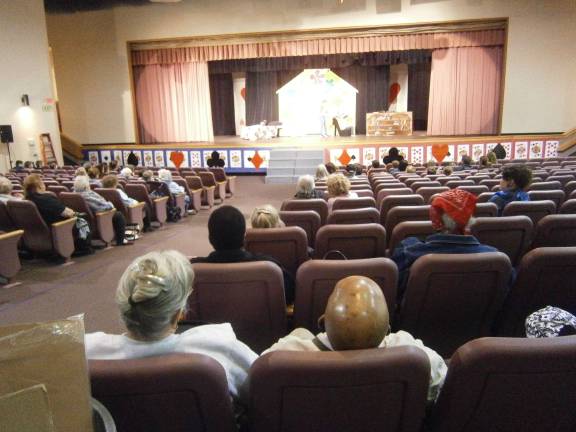Seniors and Take Your Child to Work Day participants watch the theater sneak peek (Photo provided)