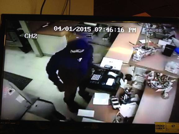Leads sought on armed robbery of pizza shop