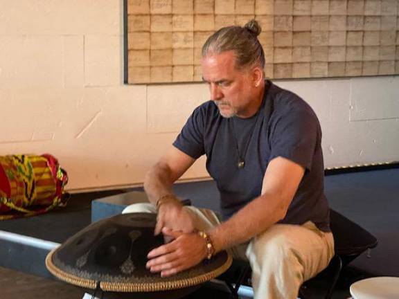 Todd Anderson playing his Handpan drum