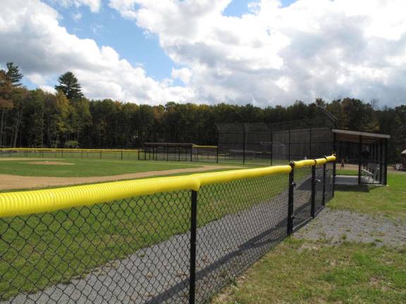 One of the baseball fields with safety guard covering the fencing.