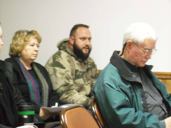 Resident Justin Snyder (center) expresses his concerns over the new Columbia Gas Compressor Station.(Photo by Charles Reynolds)