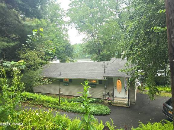 Enjoy water views from this well-maintained affordable lakefront