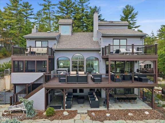Experience luxury indoor-outdoor living on a mountaintop retreat