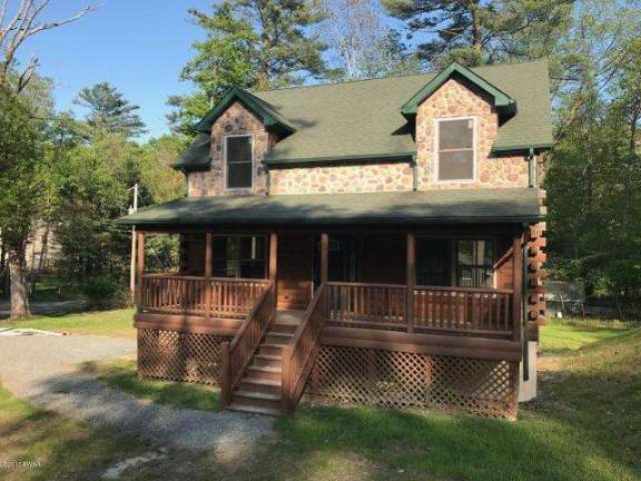 Brand new three-bedroom log and stone country cape