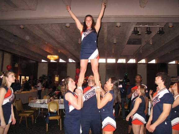 Penn State cheerleaders demonstrated some fancy moves. (Photo by Jerry Goldberg)