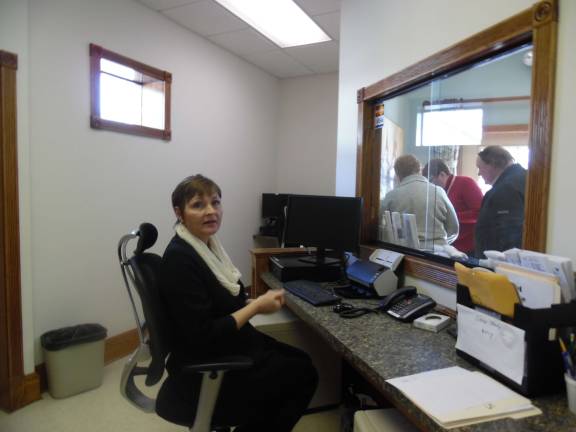 Mary Decker, community liaison, sits at the sleep monitors in the new sleep lab. (Photo by Anya Tikka)