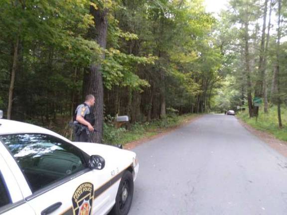 A police checkpoint near the home of Eric Matthew Frein on Saturday (Photo by Nathan Mayberg)