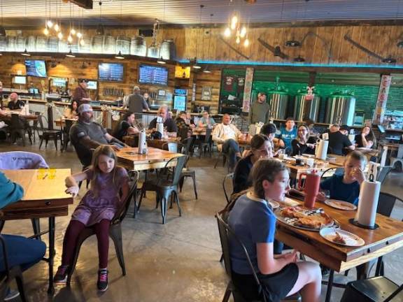 Audience enjoys an evening of Karaoke at Back Road Brewing.