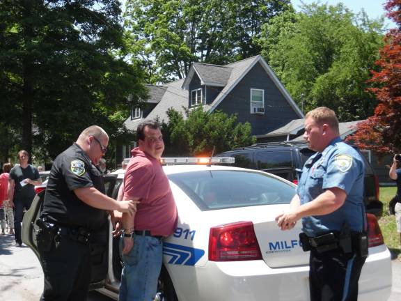 The Milford police arrest Robert Pacella Jr., 45, of Milford, the driver that caused the accidents (Photo by Anya Tikka)
