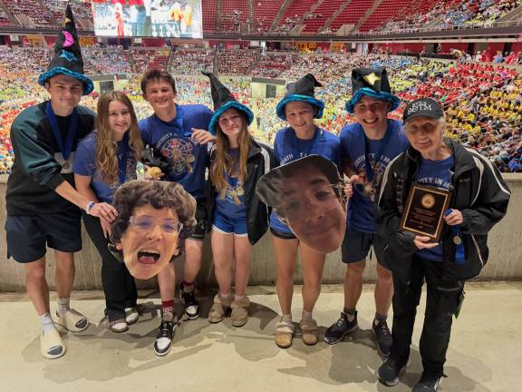 Left to right: Grant Nielsen, Clare Barcia, Patrick Fleming, Angelica Barcia, Brooke Nielsen, Connor Giblin, and Coach Terry Balton, with Beau Tannenbaum pictured in cutouts.