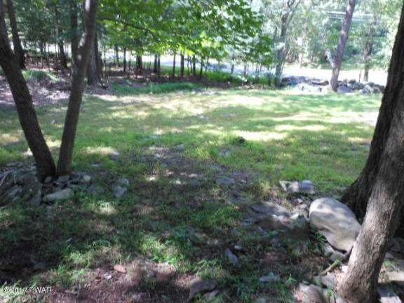 Remodeled ranch with rights to 120-acre lake