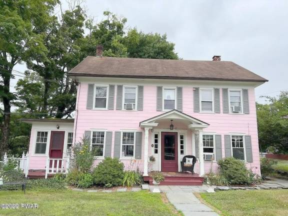 Live and work in a streamfront colonial in historic Milford Borough