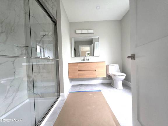 Just built, spacious and move-in ready with three-plus bedrooms