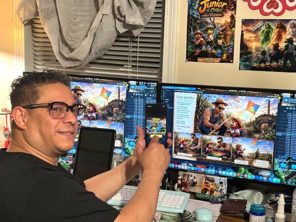 Mariano Cortes shows off his new game Junior el Coquí Puerto Rican cultural adventure game.