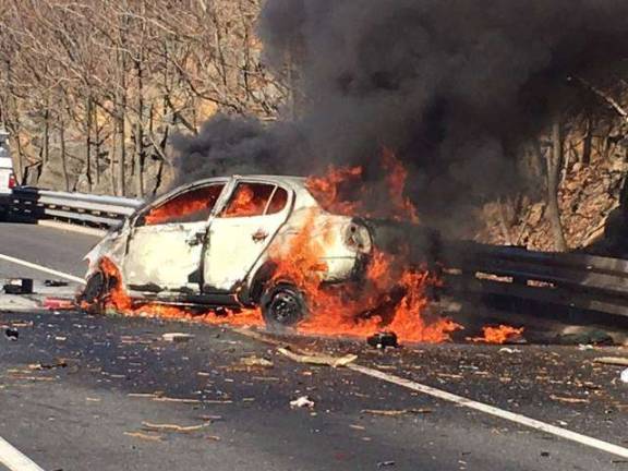 Dingma's deputy fire chief, Michael LaPadula, pulled a man out of this burning car (Photo courtesy Dingman Volunteer Fire Department)