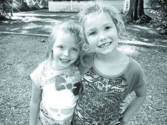 Grace Stevens with friend and classmate 1st grade &quot;I was nervous; I feel better now.&quot;