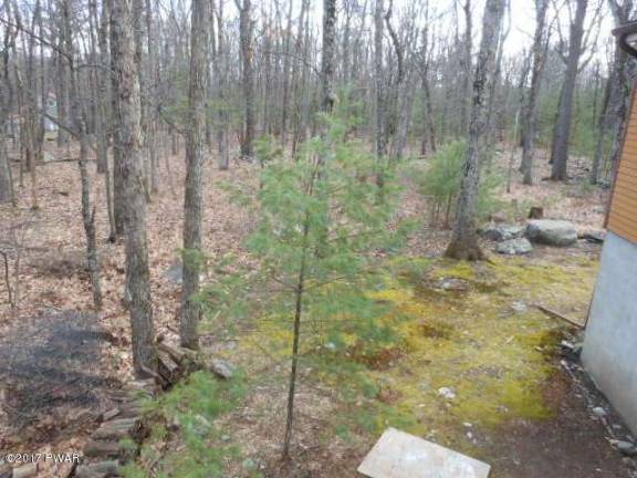 Updated country ranch with lake rights