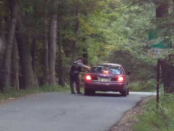 A police checkpoint near the home of Eric Matthew Frein on Saturday (Photo by Nathan Mayberg)