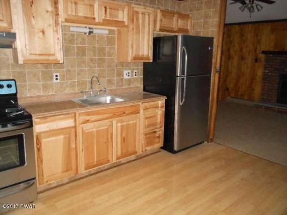 Updated country ranch with lake rights