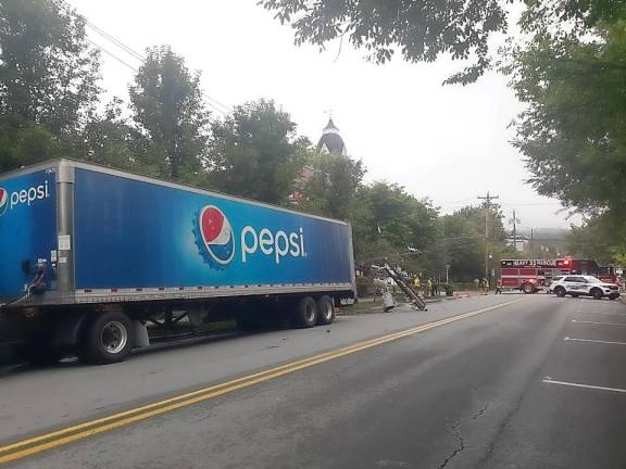 A Pepsi truck hit a utility pole on Broad St.