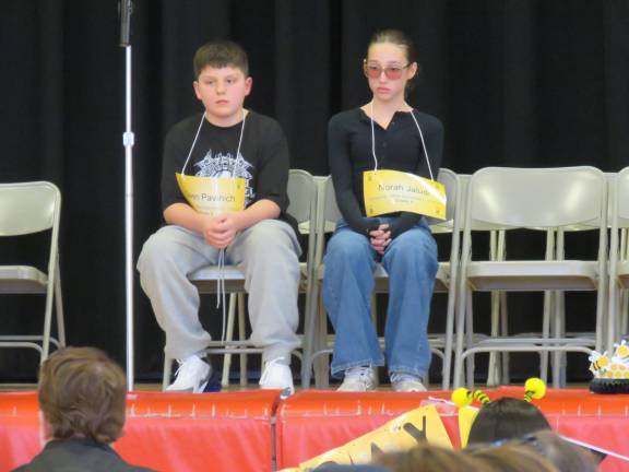 Fifth graders Owen Pavinich and Norah Jaludi in the final moments of the spelling bee.