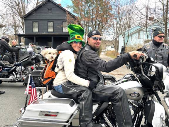 Gina Torrado and Stephen Flynn of American Legion Riders with a furry passenger.