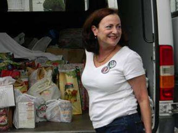 Volunteer Kelle Hankins unloads food donations collected at the Share the Harvest dinner for the Ecumenical Food Pantry on West Catherine Street in Milford Borough. (Photos provided)