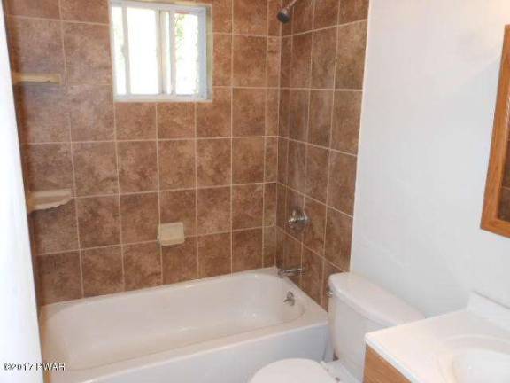 Remodeled ranch with rights to 120-acre lake