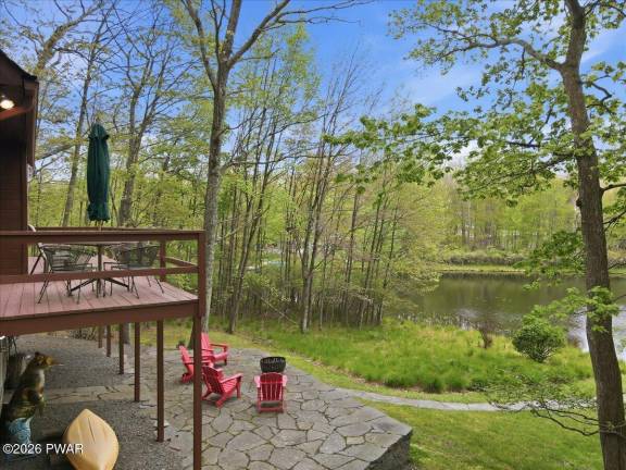 Lakefront home brings the outdoors in with spectacular views