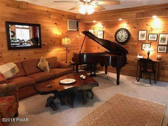 Enjoy woods and water in this two-story country farmhouse