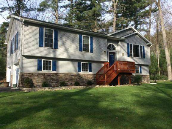 Corner bilevel has lake rights