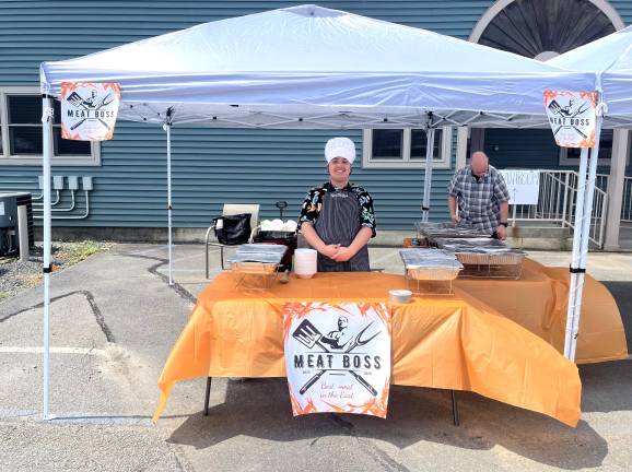 A young entrepreneur at the 2025 fair.