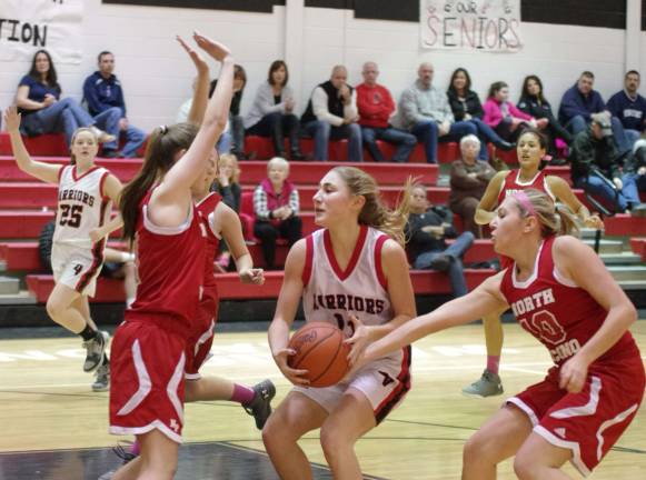 Delaware Valley’s Shelby Brittain challenged by the North Pocono defense.