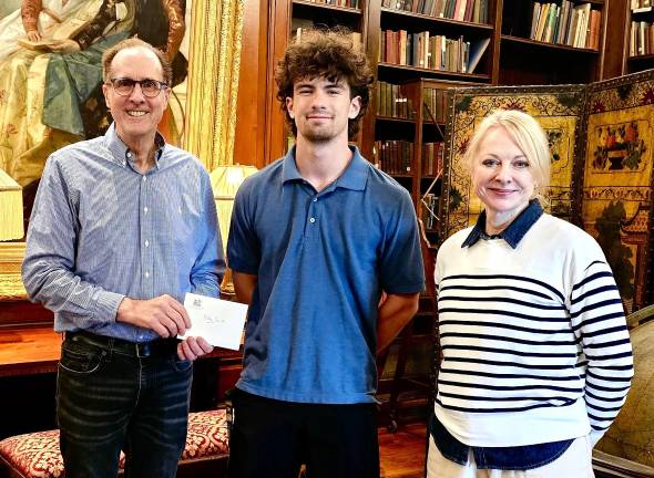 Riley Smith from Delaware Valley High School (center) receives the Pinchot Legacy Scholarship.