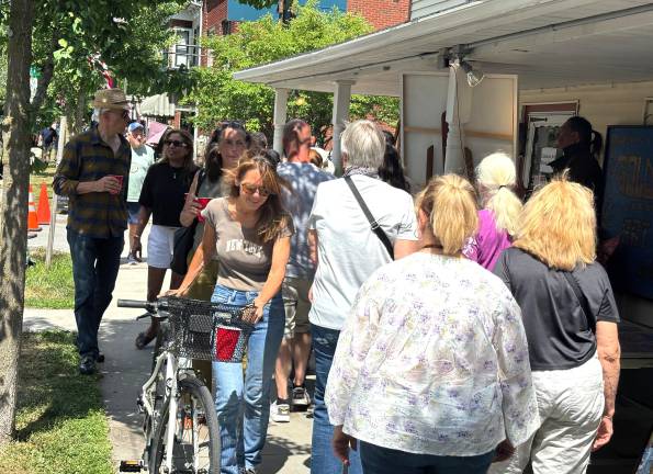 Wall-to-wall people on Broad Street during the Milford Music Festival.