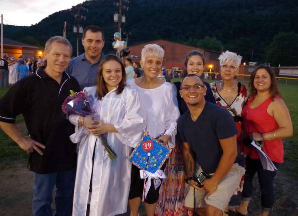 Second from left Delaware Valley High School graduate Katlyn Vallis with her family.