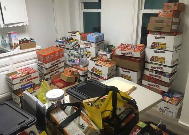 Middle schoolers bring in a haul of food (Photo provided)