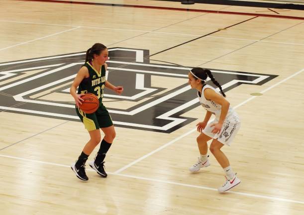 Notre Dame’s Krista Kissell is covered by Delaware Valley’s Stephanie O’Grady. Kissell scored 35 points.