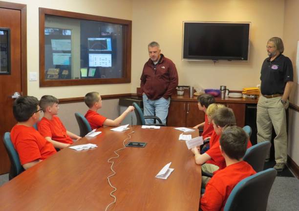During interview, in back (from left): Mr. Kevin Moscatiello, Mr. John Snure; around table: Townes Markwalter, Logan Long, Colin Anderson, Gideon Yost, Joe Germaine-Norton, Johnny Llewellyn, and Connor Giblin (Photo by Peg Snure)