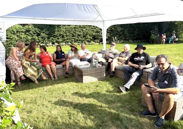 Some of the Pike Opera supporters sitting under the tent waiting for the speeches to begin.