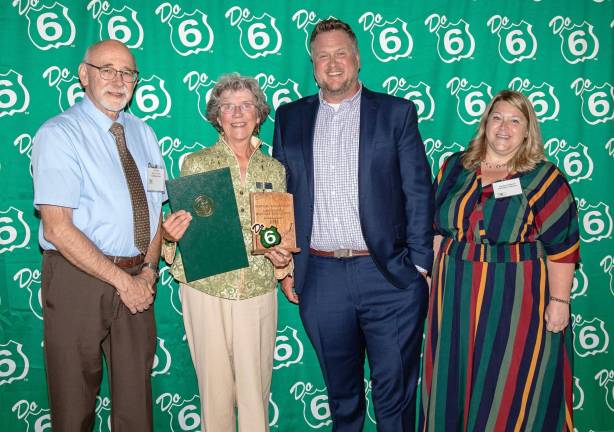 Linda Pinto of Grey Towers Heritage Association (second from left) accepts the “Do 6” Partnership Award from PA Route 6 Alliance Board President Dan Glotz, James Hamill of the Pocono Mountains Visitors Bureau, and PA Route 6 Alliance Executive Director Candace Hillyard.